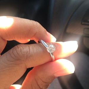 Diamond ring. .75 carat, white gold band